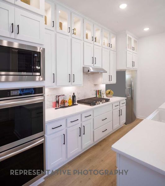 Furnished interior view inside a new home in Bridgeland, Cypress (Image 15).