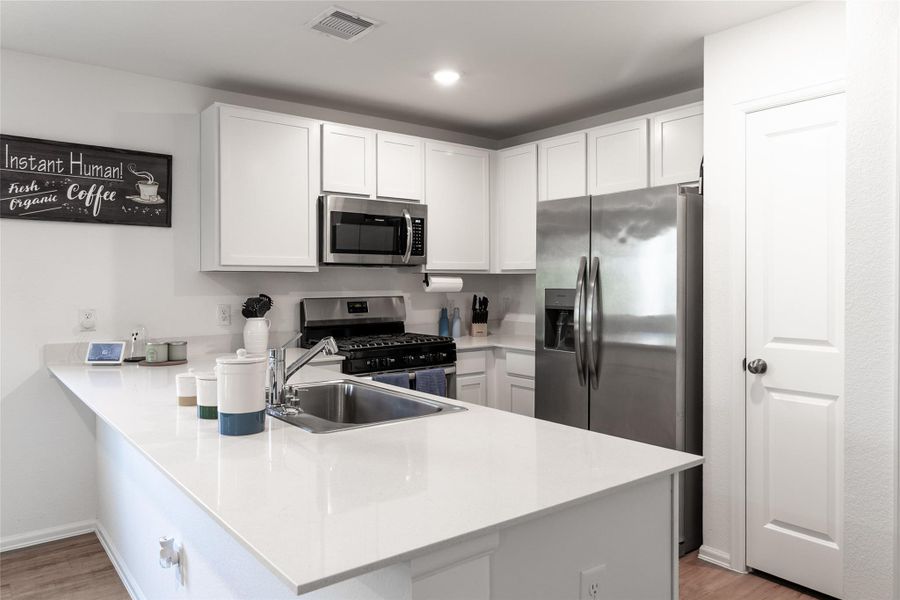 Furnished interior view inside a new home in Burnet Fields at Baytown Crossings, Baytown (Image 9). Furnished interior view inside a new home in Burnet Fields at Baytown Crossings, Baytown (Image 9).