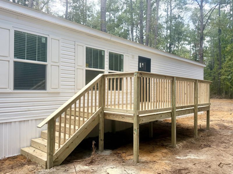 Exterior details and patio area of a home in , Round O (Image 9).