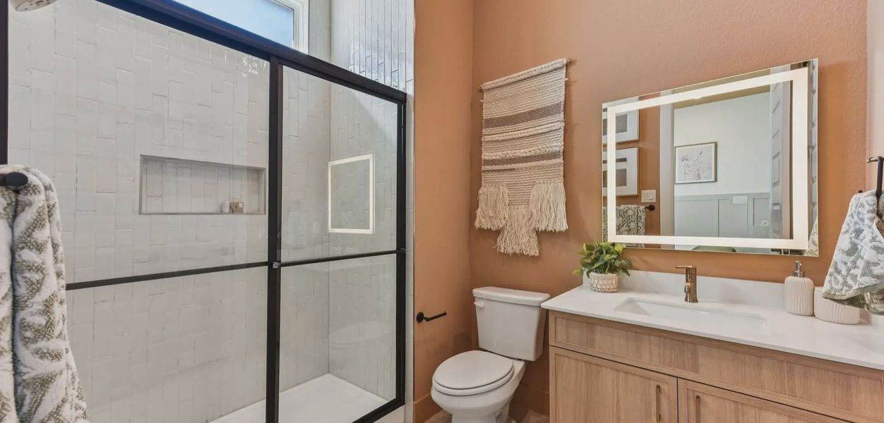 Representative furnished interior of a home built from the Silas by Chesmar Homes in The Grove at Blackhawk, Pflugerville (Image 14).