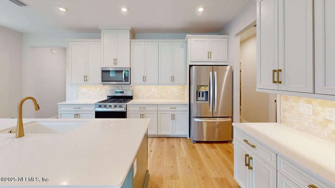 Furnished interior view inside a new home in RiverTown - WaterSong, St. Johns (Image 14). Furnished interior view inside a new home in RiverTown - WaterSong, St. Johns (Image 14).