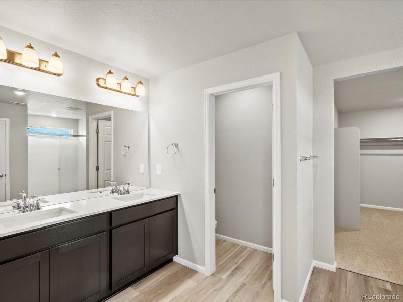 Furnished interior view inside a new home in Buffalo Highlands: The Canyon Collection, Commerce City (Image 9).