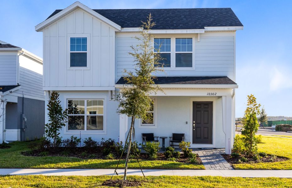 Representative exterior photo of a completed home built from the Mabel II by Pulte Homes in EverBe, Orlando, FL (Image 21).