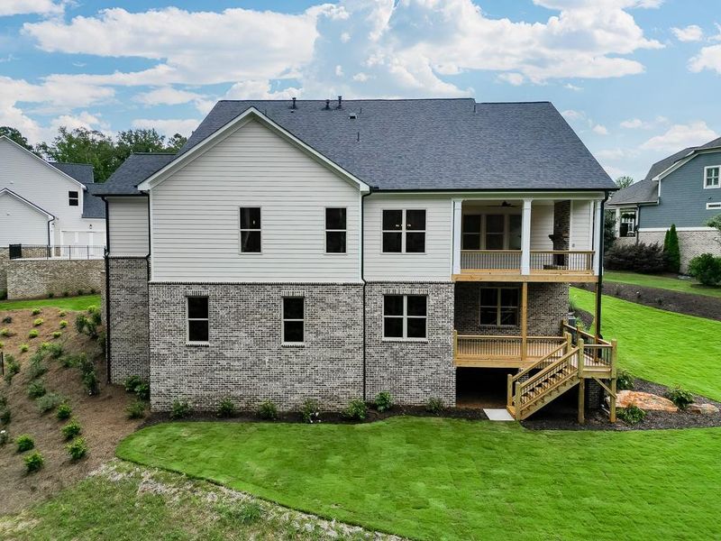 Front exterior of a new home in , Cumming, GA, highlighting curb appeal (Image 25). Front exterior of a new home in , Cumming, GA, highlighting curb appeal (Image 25).