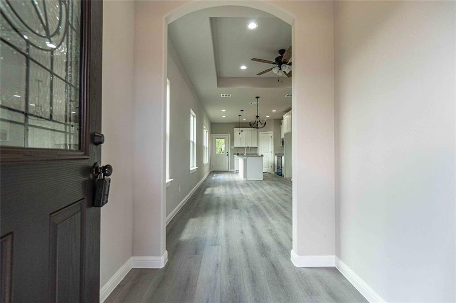 Hall featuring light hardwood / wood-style flooring