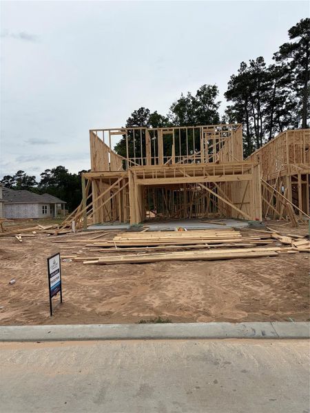 In-progress construction of a new home in Lakes at Black Oak, Magnolia, TX (Image 19).