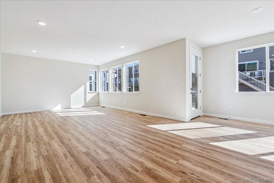 Spacious, unfurnished interior of a new home in Floret Collection at Alder Creek, Parker (Image 29).