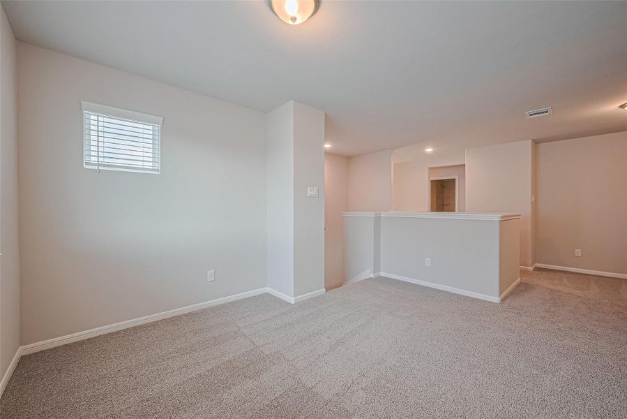 Spacious, unfurnished interior of a new home in Sunterra, Katy (Image 25).