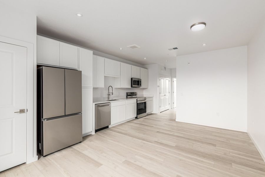 Furnished interior view inside a new home in The Scene at Sloan's Lake, Denver (Image 4).