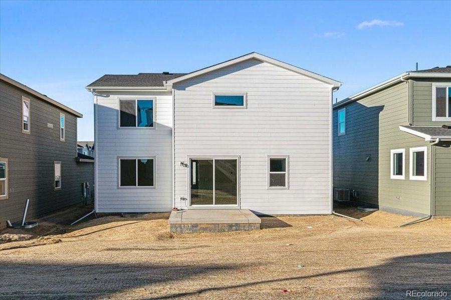 Exterior details and patio area of a home in Floret Collection at Alder Creek, Parker (Image 2). Exterior details and patio area of a home in Floret Collection at Alder Creek, Parker (Image 2).