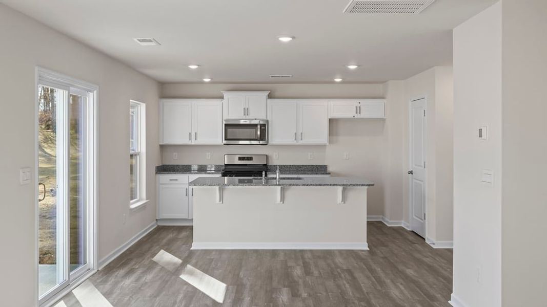 Furnished interior view inside a new home in Bentley Park, Greenwood (Image 8).