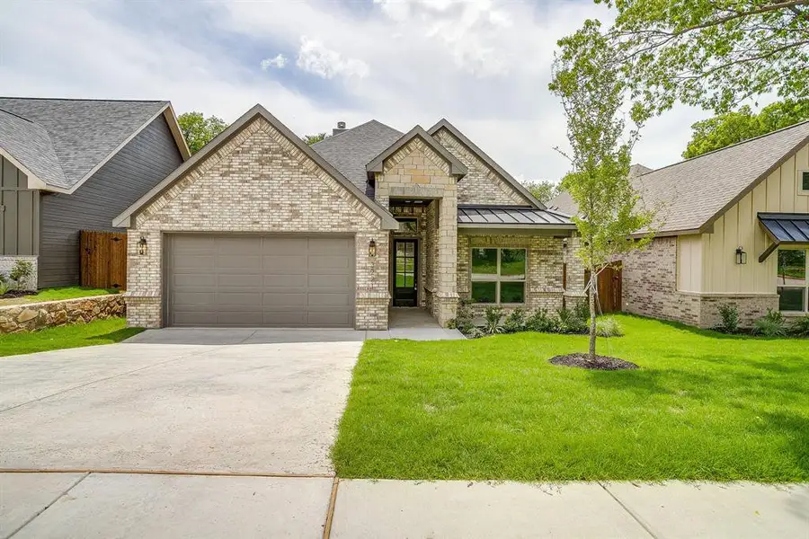 Front exterior of a new home in , Fort Worth, TX, highlighting curb appeal (Image 2). Front exterior of a new home in , Fort Worth, TX, highlighting curb appeal (Image 2).