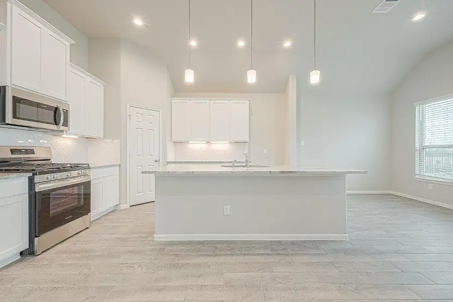 Furnished interior view inside a new home in Grand Magnolia, Magnolia (Image 10).