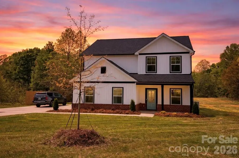Front exterior of a new home in , Denver, NC, highlighting curb appeal (Image 1). Front exterior of a new home in , Denver, NC, highlighting curb appeal (Image 1).