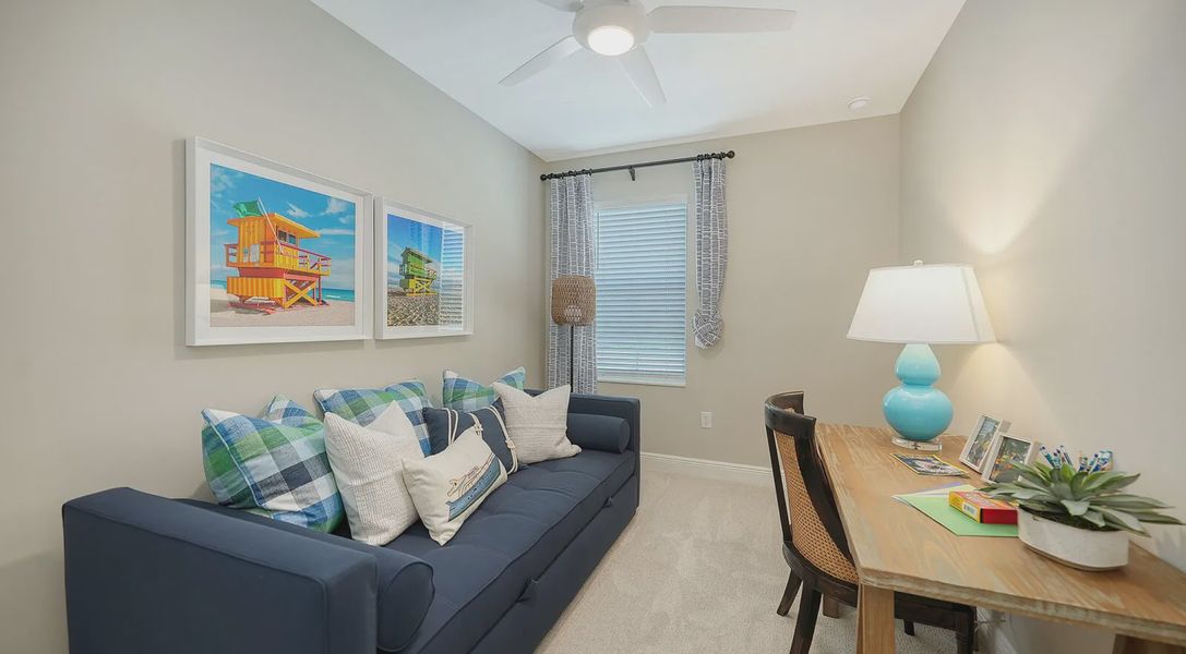 Representative furnished interior of a home built from the Avery by Neal Communities in SkySail, Naples (Image 8).