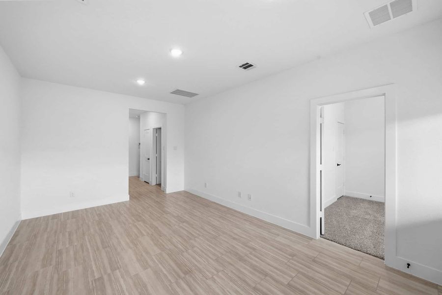 Spacious, unfurnished interior of a new home in Bridgeland, Cypress (Image 14).