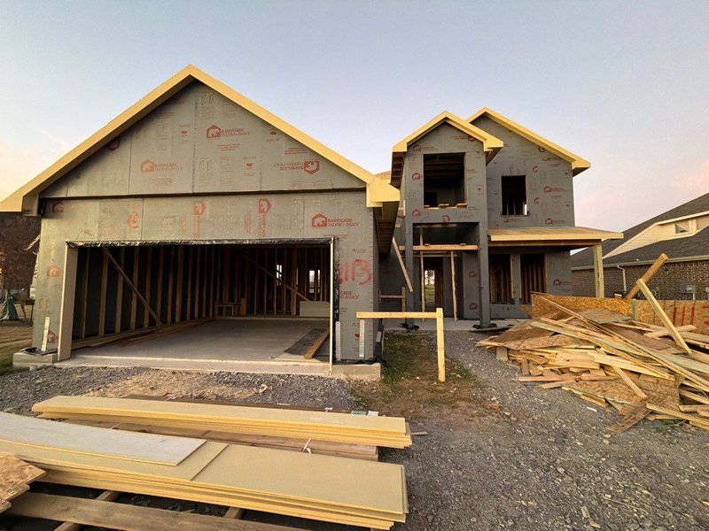 In-progress construction of a new home in Covenant Springs, Springtown, TX (Image 4).
