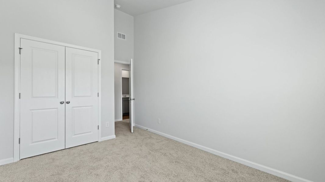 Representative unfurnished interior of a home built from the DENMARK by D.R. Horton in Pine Hills Townhomes at Cane Bay, Summerville (Image 28).