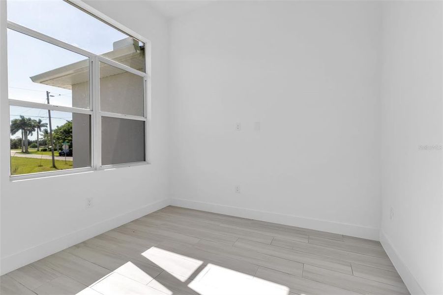 Spacious, unfurnished interior of a new home in , Punta Gorda (Image 53).