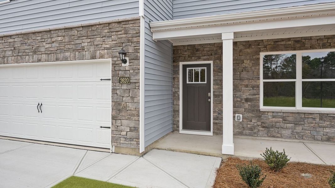 Exterior details and patio area of a home in Villa Grande, Winterville (Image 3).