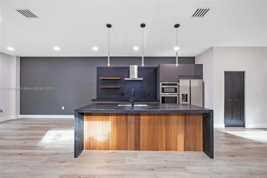 Furnished interior view inside a new home in , Miami (Image 16). Furnished interior view inside a new home in , Miami (Image 16).