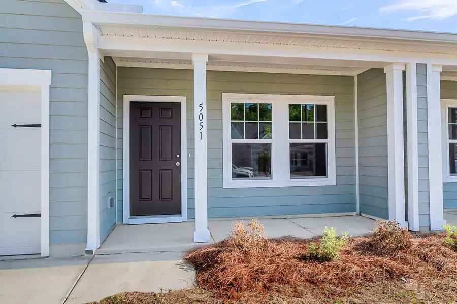 Exterior details and patio area of a home in , Ravenel (Image 4). Exterior details and patio area of a home in , Ravenel (Image 4).