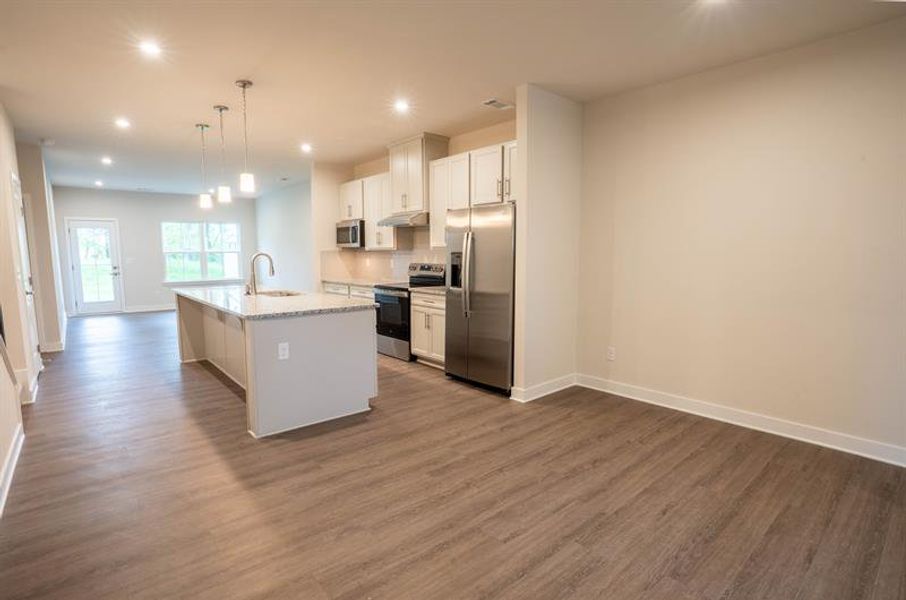 Furnished interior in a model home at Spring Branch Townhomes in Smyrna (Image 12).