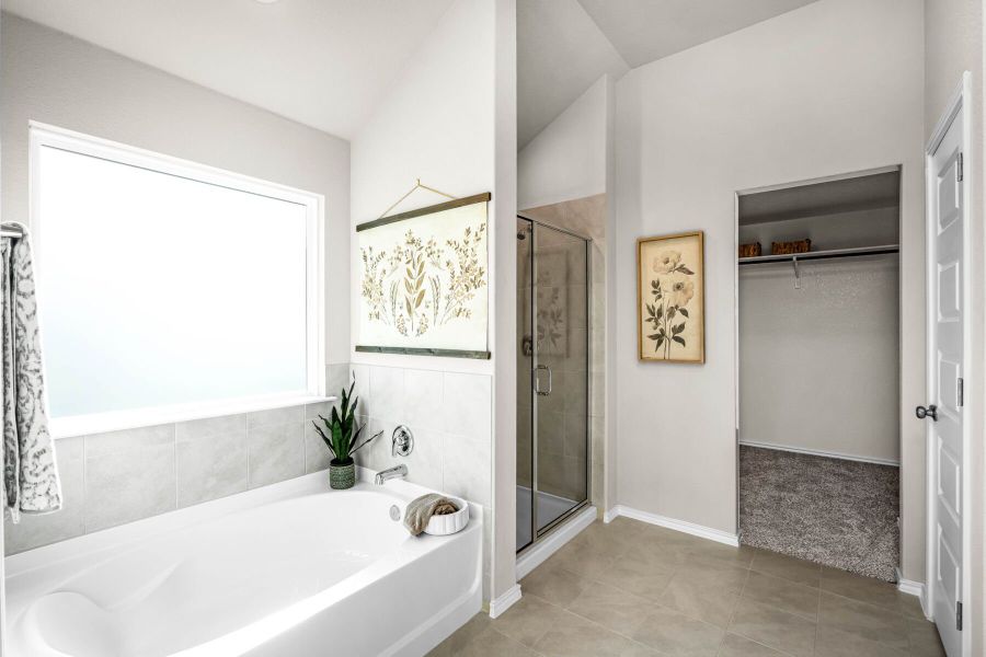 This is the primary bathroom of the Hawkins plan and is the model home in Carillon at 13305 Eppright Trace Blvd., Manor, TX. This is the primary bathroom of the Hawkins plan and is the model home in Carillon at 13305 Eppright Trace Blvd., Manor, TX.