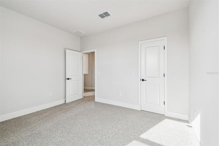 Spacious, unfurnished interior of a new home in Waterset Tradition Series, Apollo Beach (Image 39).