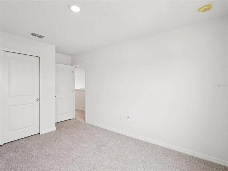 Spacious, unfurnished interior of a new home in Magnolia Bay - Classic Series, Nokomis (Image 20).