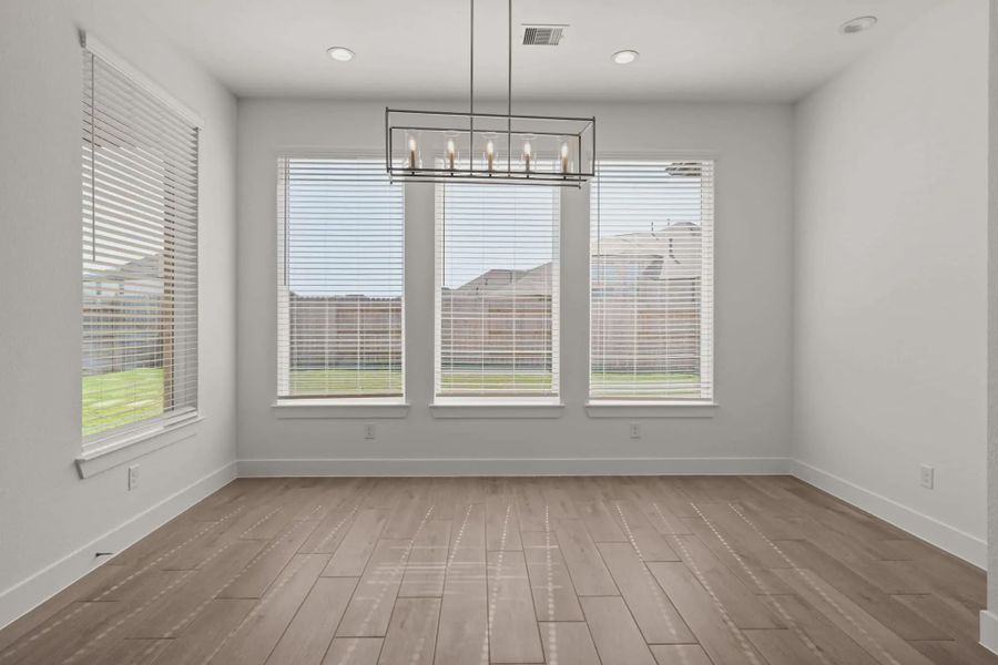 Representative unfurnished interior of a home built from the Malani by Chesmar Homes in Wildrye 60', Waller (Image 5).