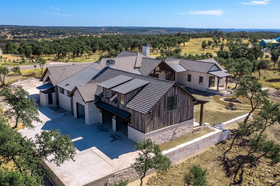 Front exterior of a new home in , Fredericksburg, TX, highlighting curb appeal (Image 12).