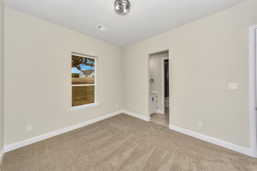 View of carpeted spare room