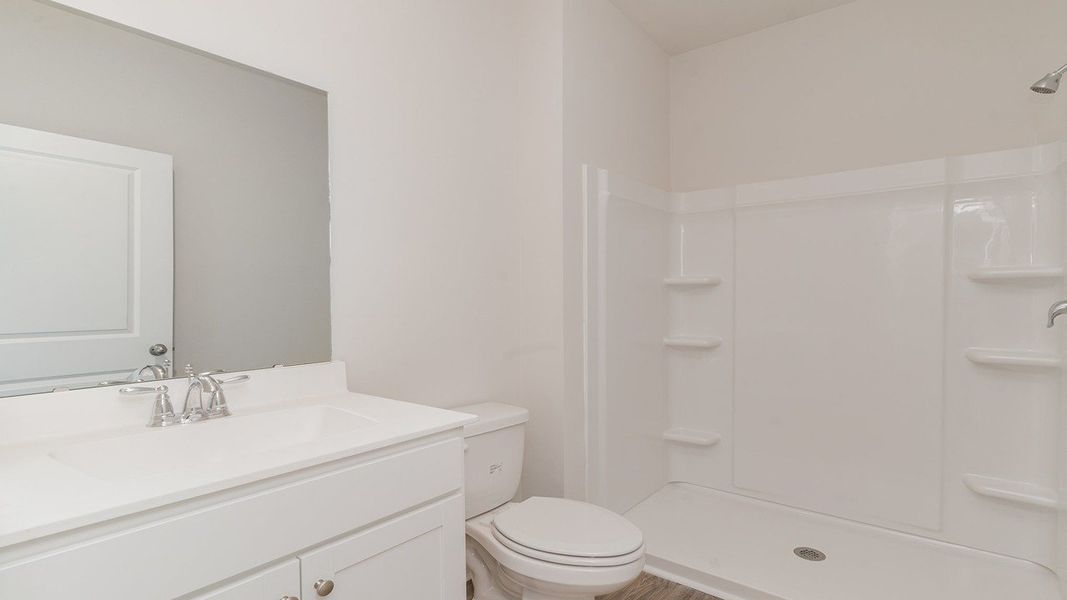 Representative furnished interior of a home built from the ROBIE by D.R. Horton in Sandridge Park, Little River (Image 6).