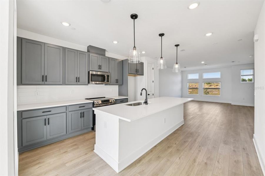 Furnished interior view inside a new home in Parkview at Hamlin, Winter Garden (Image 7). Furnished interior view inside a new home in Parkview at Hamlin, Winter Garden (Image 7).