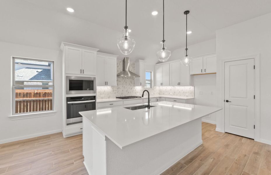 Furnished interior view inside a new home in Saddleback at Santa Rita Ranch, Liberty Hill (Image 5). Furnished interior view inside a new home in Saddleback at Santa Rita Ranch, Liberty Hill (Image 5).