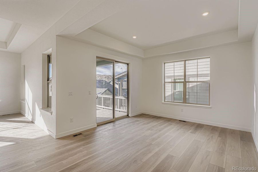 Spacious, unfurnished interior of a new home in Red Rocks Ranch: The Grand Collection, Morrison (Image 9).