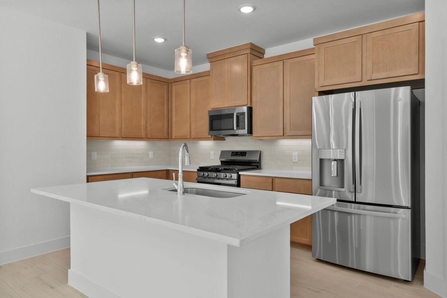 Furnished interior view inside a new home in Meridiana, Iowa Colony (Image 8).