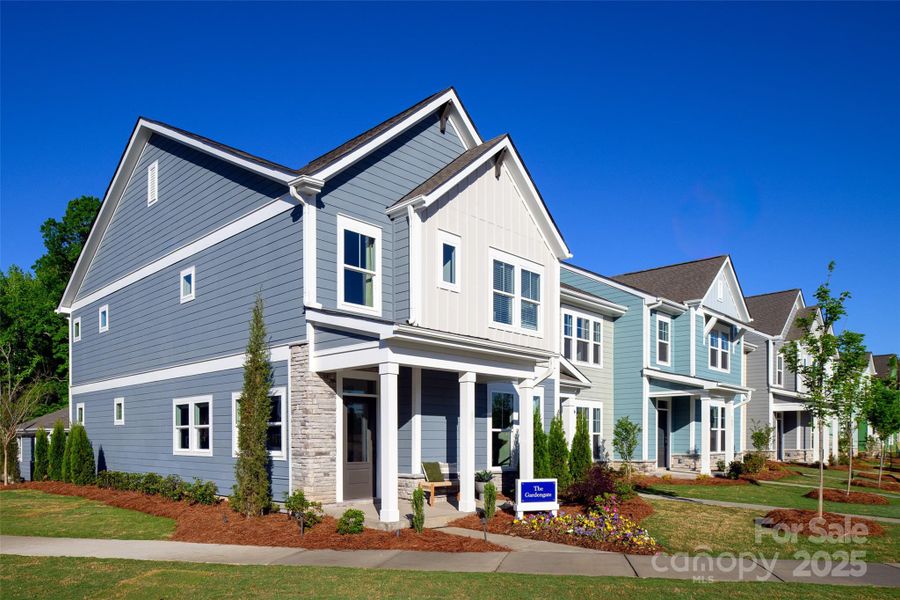 Front exterior of a new home in North Creek Village, Huntersville, NC, highlighting curb appeal (Image 23).