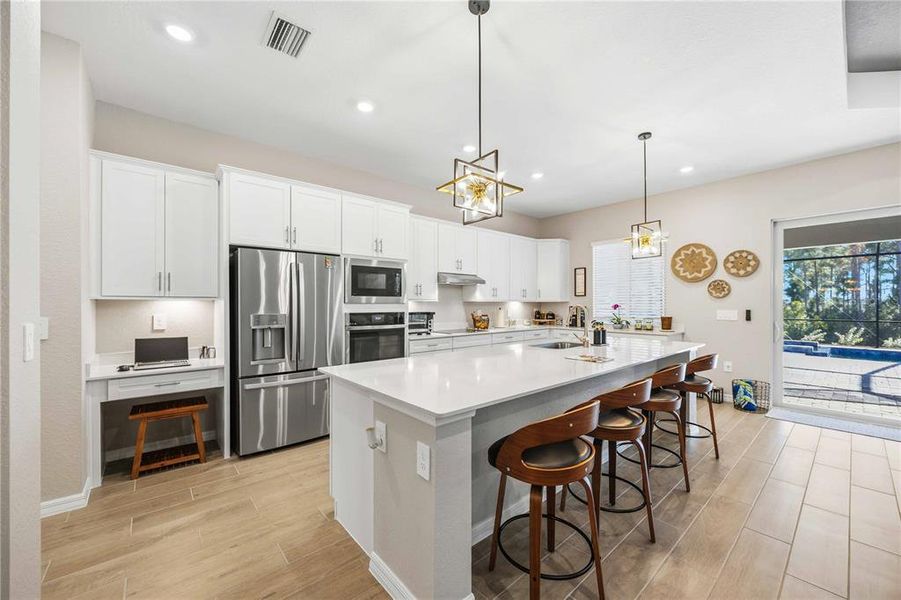 Furnished interior view inside a new home in Wellen Park Golf & Country Club, Venice (Image 6).