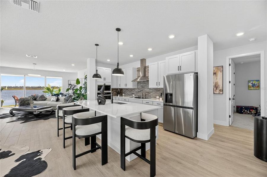Furnished interior view inside a new home in The Peninsula at Rhodine Lake, Riverview (Image 21).