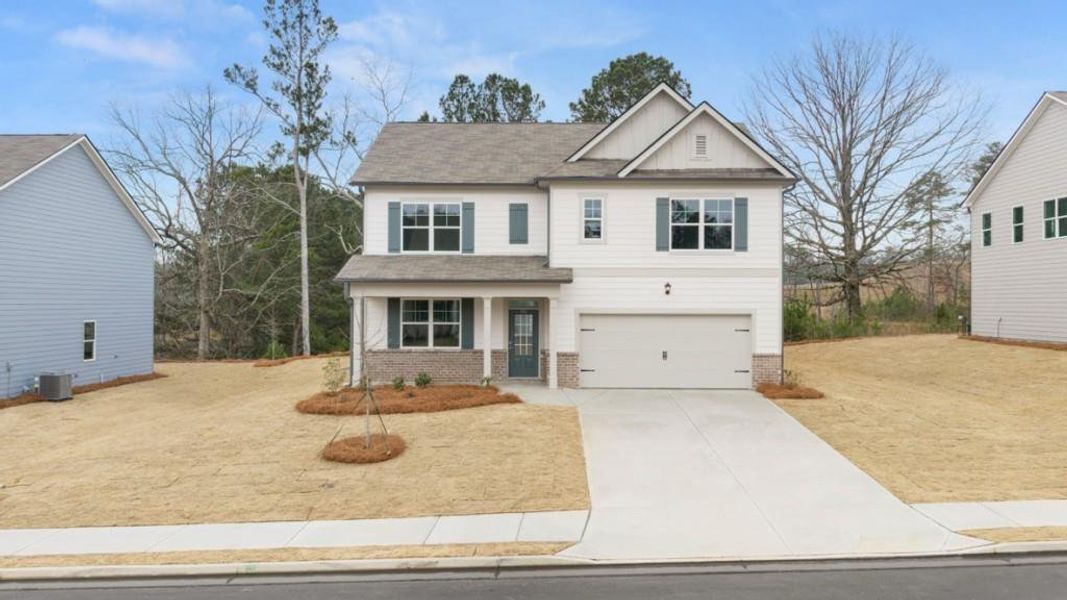 Front exterior of a new home in Thompson Ridge, Dallas, GA, highlighting curb appeal (Image 17).