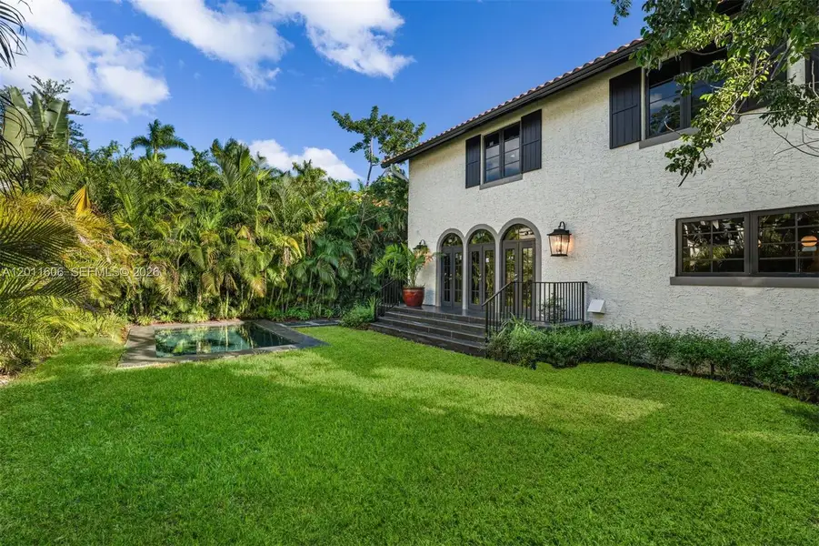 Exterior details and patio area of a home in , Miami (Image 3).
