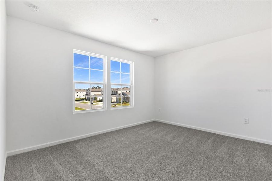 Spacious, unfurnished interior of a new home in Seasons at Shores of Lake Dell, Dundee (Image 17).