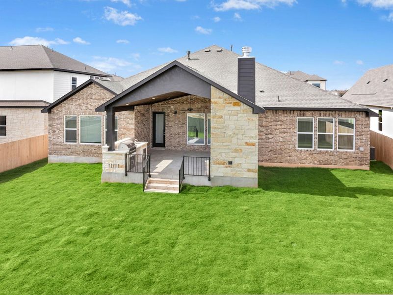 Exterior details and patio area of a home in Santa Rita Ranch, Liberty Hill (Image 26).
