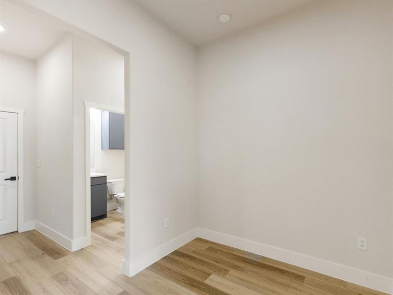 Unfurnished room featuring light wood-style flooring and recessed lighting