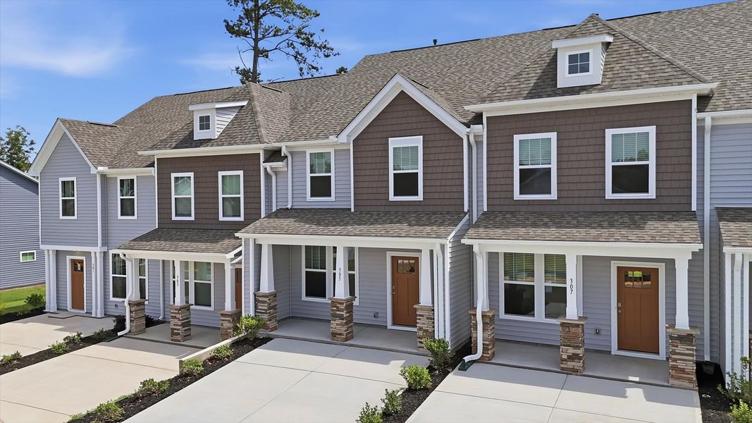 Front exterior of a new home in Clarke Townes, Anderson, SC, highlighting curb appeal (Image 2). Front exterior of a new home in Clarke Townes, Anderson, SC, highlighting curb appeal (Image 2).