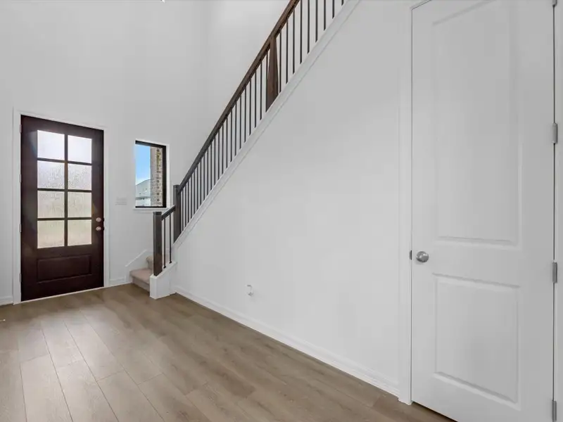 Home entry. Sample product photo. Actual exterior and interior selections may vary by homesite. Photo may be virtually staged.