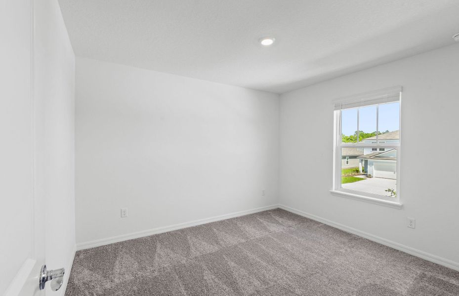 Spacious, unfurnished interior of a new home in Wells Landing, Jacksonville (Image 9).