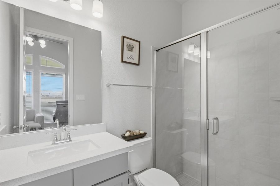 Private ensuite bath features a walk-in showerfor added guest convenience. Private ensuite bath features a walk-in showerfor added guest convenience.